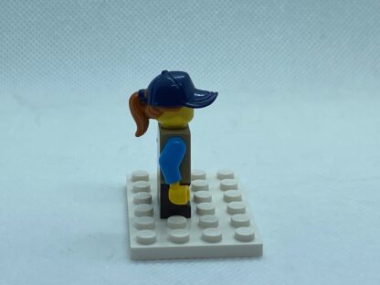 LEGO Minifigure Girl, Freckles, Dark Tan Vest Over Dark Azure Shirt, Dark Blue Cap - Image 2