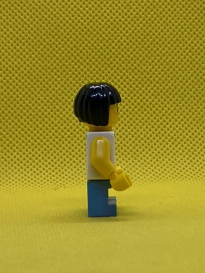 LEGO Child - Girl, White Halter Top Minifigure with Green Apples and Lime Spots, Medium Blue Short Legs, Black Bob Cut Hair, Freckles - Image 3